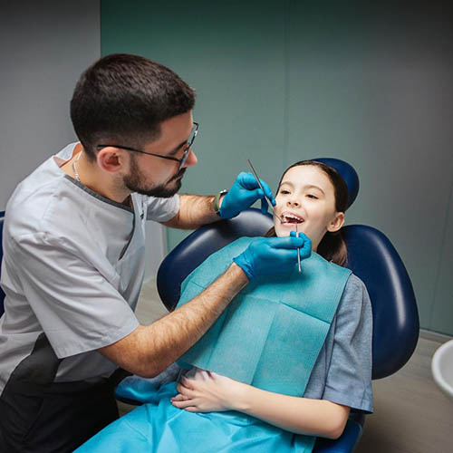 Best dentist in Gurgaon — Dr. Suresh Ahlawat at Muskaan Dentals, 4 NABH-accredited branches