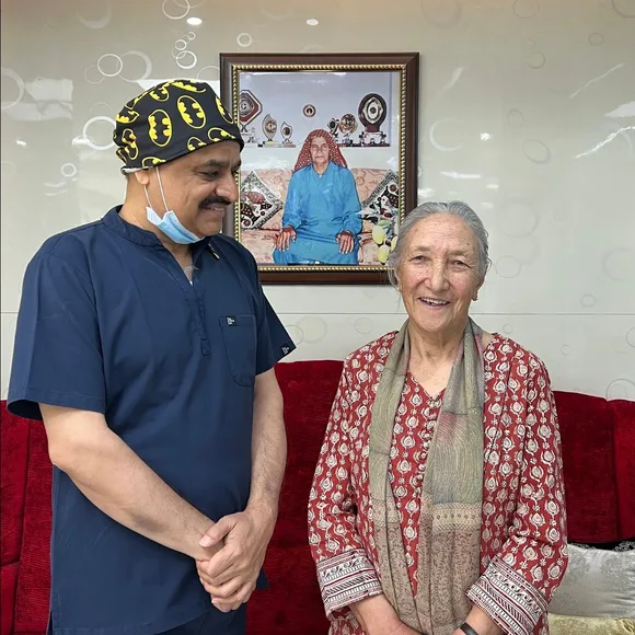 Dr Suresh Ahlawat with patient Gurgaon — Muskaan Dentals patient care