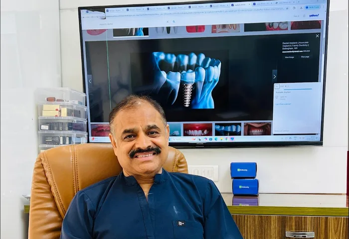 Dr Suresh Ahlawat at implant clinic Gurgaon — best dentist in gurugram